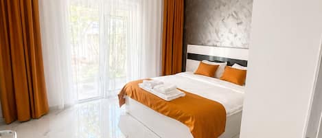 Apartment, Garden View | Iron/ironing board, free WiFi