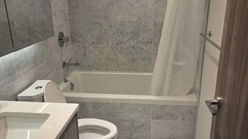 Hair dryer, towels, soap, toilet paper