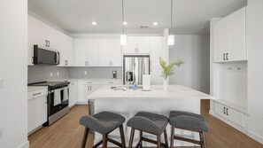 Fridge, dining tables - Landing | Beautiful 2BD, Gym (Dallas)