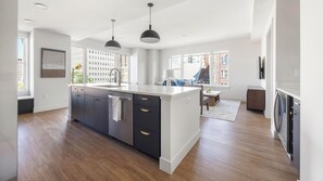 Fridge, dining tables - Landing | Modern 2BD, Rooftop Lounge, Gym (Denver)