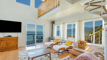 Appartement, uitzicht op oceaan | Woonruimte
