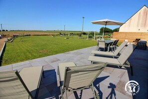 Outdoor dining - Vrbo Property (PLOUGRESCANT)