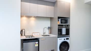 Microwave, stovetop, dishwasher, cookware/dishes/utensils