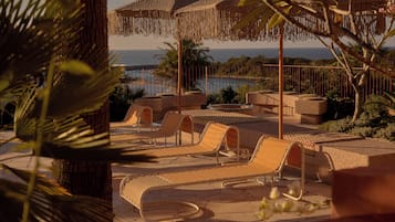 Outdoor pool, pool umbrellas, pool loungers
