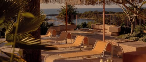 Outdoor pool, pool umbrellas, sun loungers
