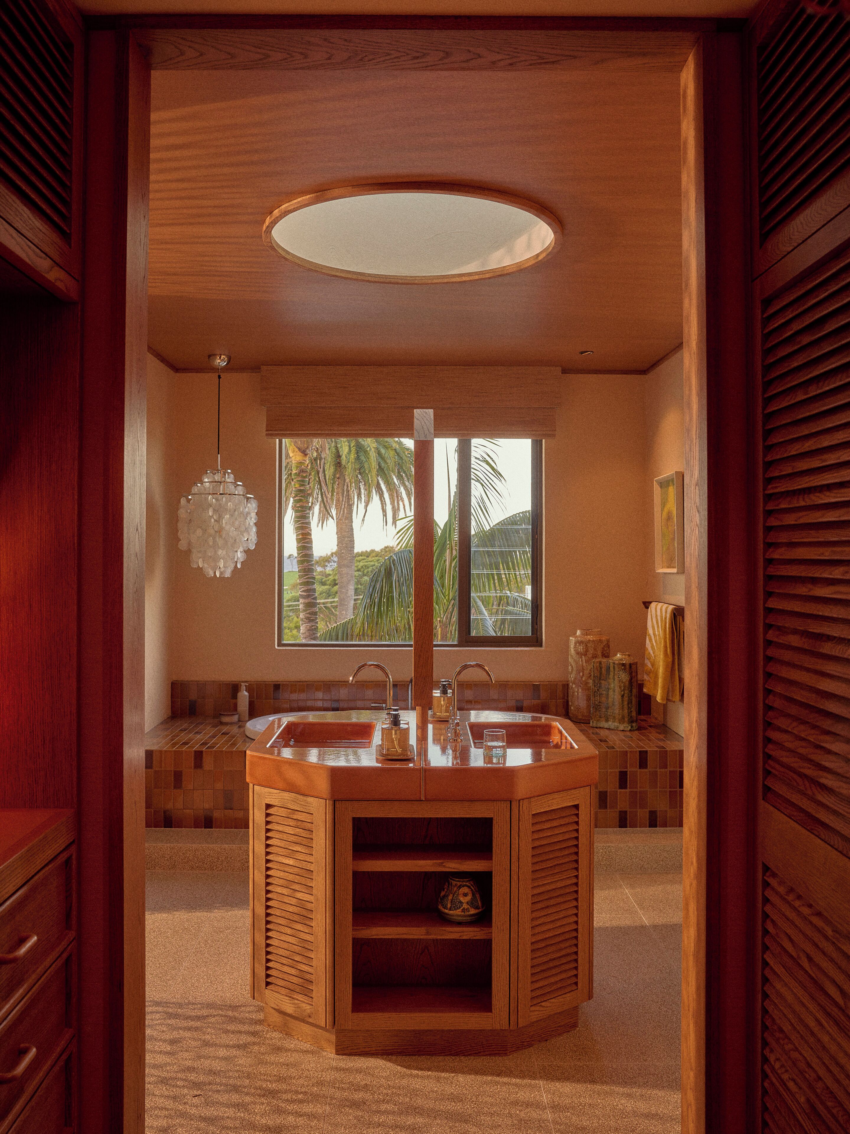 Oceanview Penthouse | Bathroom | Hair dryer, slippers, towels