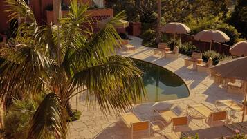 Outdoor pool, pool umbrellas, pool loungers