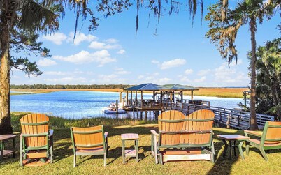 Waterfront Retreat on 2 Acres- Dock Access + Sunrise Views + Guest Suites