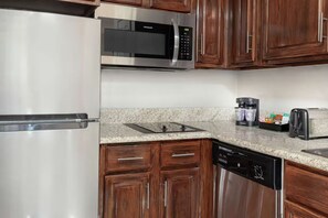 Fridge, microwave, stovetop, coffee/tea maker