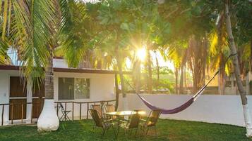 Bungalow, 2 Double Beds, Kitchen, Garden View | Outdoor dining