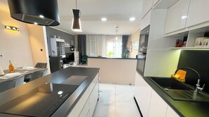 Appartement, vue mer | Cuisine privée