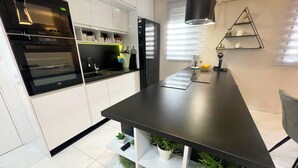 Appartement, vue mer | Cuisine privée