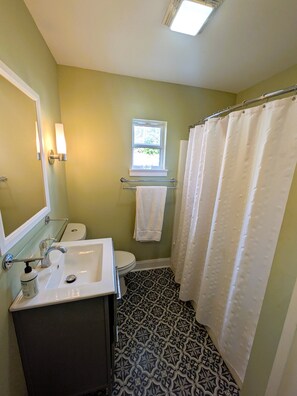 Hair dryer, towels, soap, toilet paper - Historic Creole Cottage In The Marigny (New Orleans)