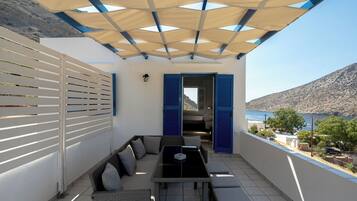 Apartament familiar, vistes a la platja | Servei de restauració a l'aire lliure