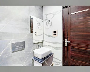 Deluxe tweepersoonskamer | Badkamer