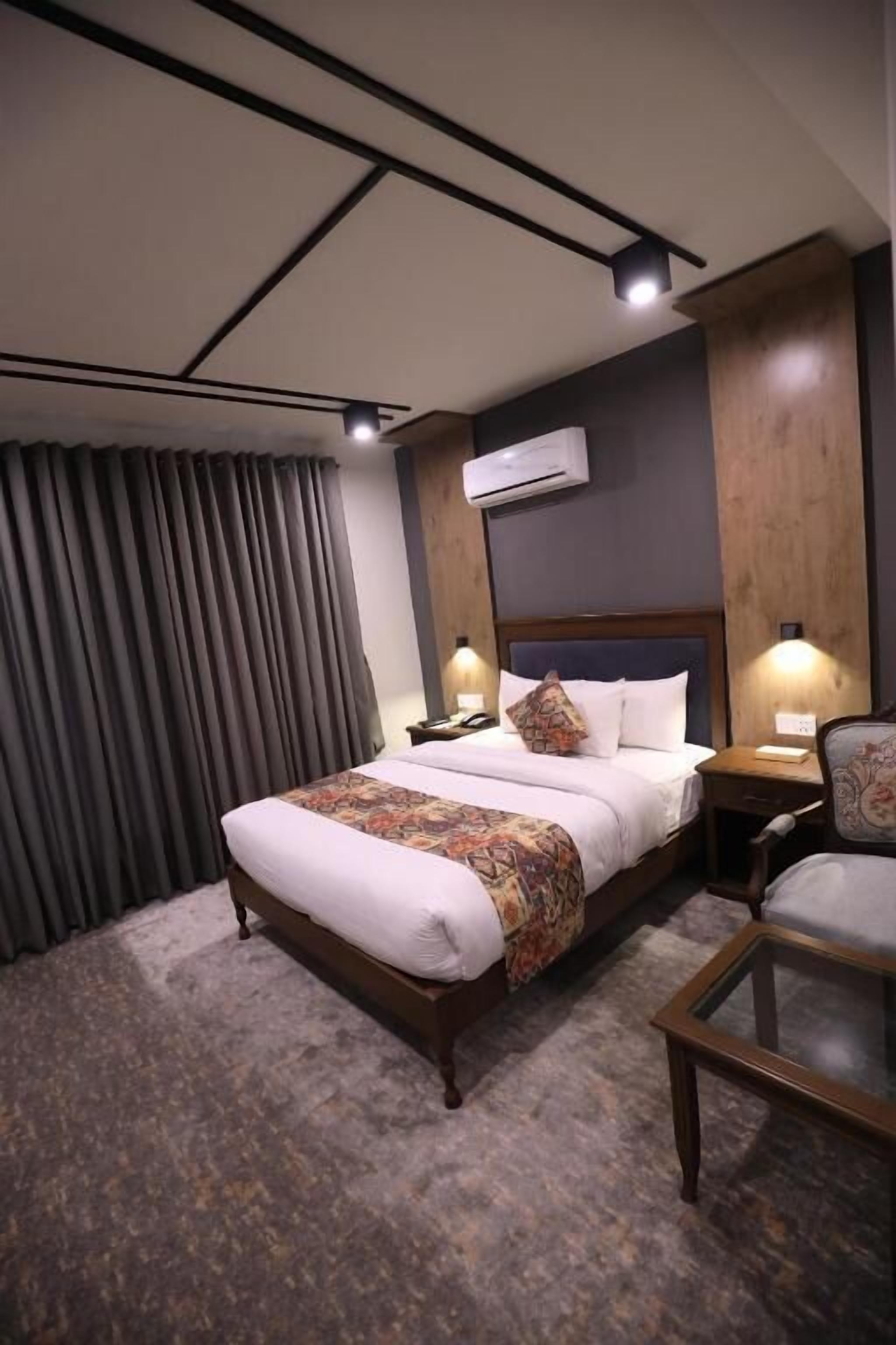 Chambre Deluxe | Fer et planche à repasser, Wi-Fi gratuit
