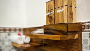 Shower, free toiletries, towels, soap