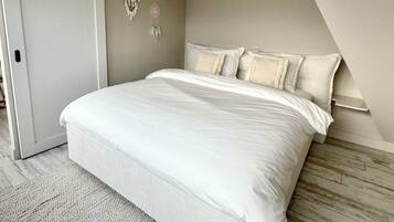 1 chambre, coffres-forts dans les chambres, fer et planche à repasser