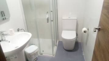 Shower, towels, soap, shampoo