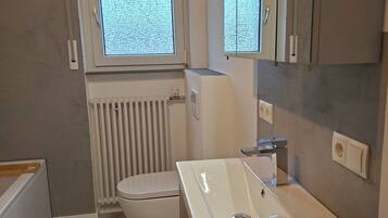 Hair dryer, towels, soap, toilet paper