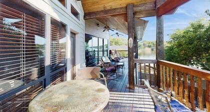 Opulent waterfront home with dock, firepit & stunning river view
