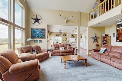 Waterfront home with kayak, view, fire pit & WiFi - dog-friendly