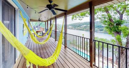 Mid-century modern lake house w/private waterfront pool & boat dock