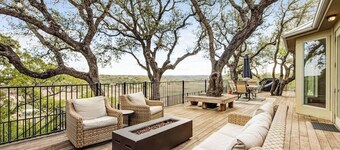 Natural cliffside oasis with impressive views, gas fireplace and dock