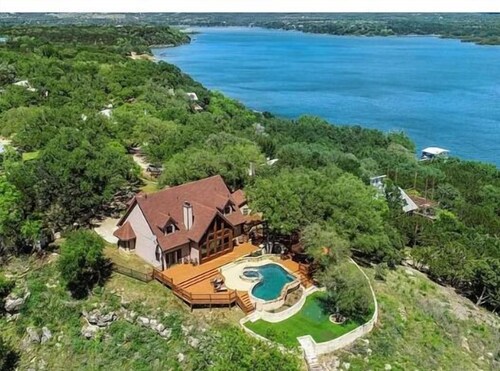 Waterfront home with private pool, patio & amazing sunset view