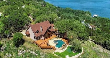 Waterfront home with private pool, patio & amazing sunset view
