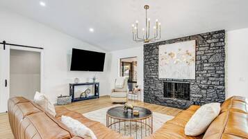 Smart TV, fireplace, DVD player, books