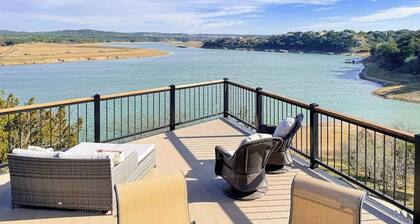 Stunning lakefront home with 2 patios, chef's kitchen, & lake access