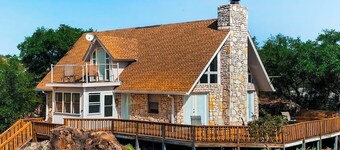 Lovely 2-story home with upper & lower decks, gorgeous lake & Hill Country views