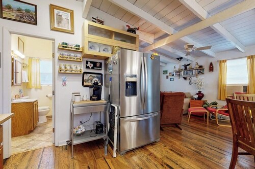 Cozy dog-friendly house near water with enclosed yard, grill, & equipped kitchen