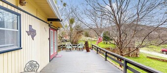 Cozy dog-friendly house near water with enclosed yard, grill, & equipped kitchen