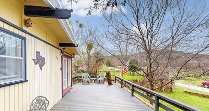 Cozy dog-friendly house near water with enclosed yard, grill, & equipped kitchen