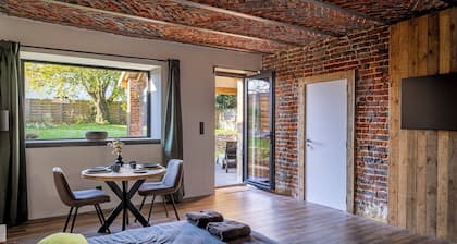 Luxury bedroom with wellness garden in farmhouse B&B