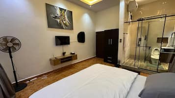 Deluxe Room, Balcony, City View | Desk, laptop workspace, blackout drapes, soundproofing