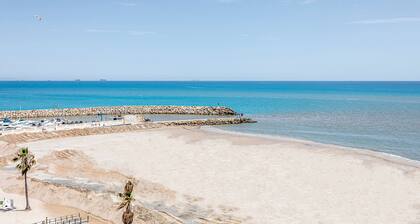 Apartment 'Entero Playa Perello' with Shared Pool, Wi-Fi and Air Conditioning