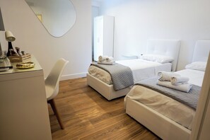 1 slaapkamer, een strijkplank/strijkijzer, wifi