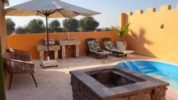 Family Room, Pool View | Terrace/patio