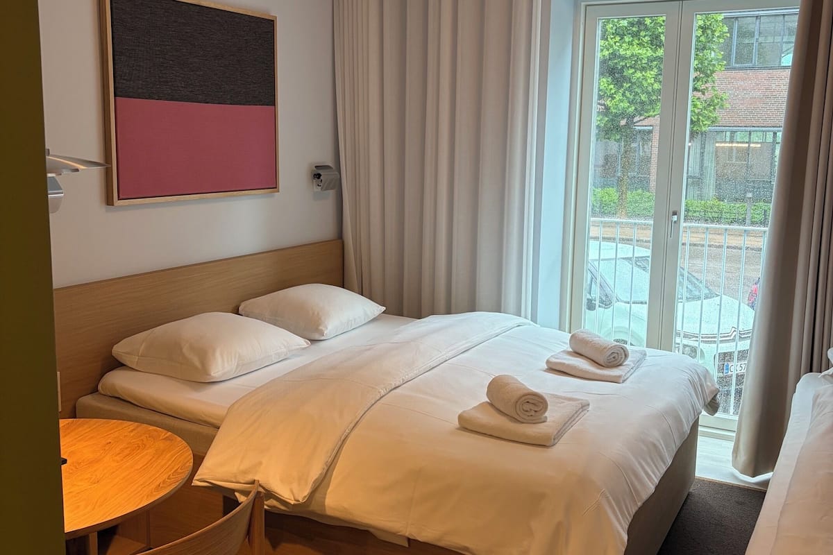 Estudio familiar, varias camas, para no fumadores | Ropa de cama hipoalergénica y espacio para trabajar con laptop