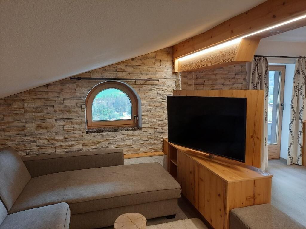 Apartamento conforto, sacada, vista para a montanha | Área de estar