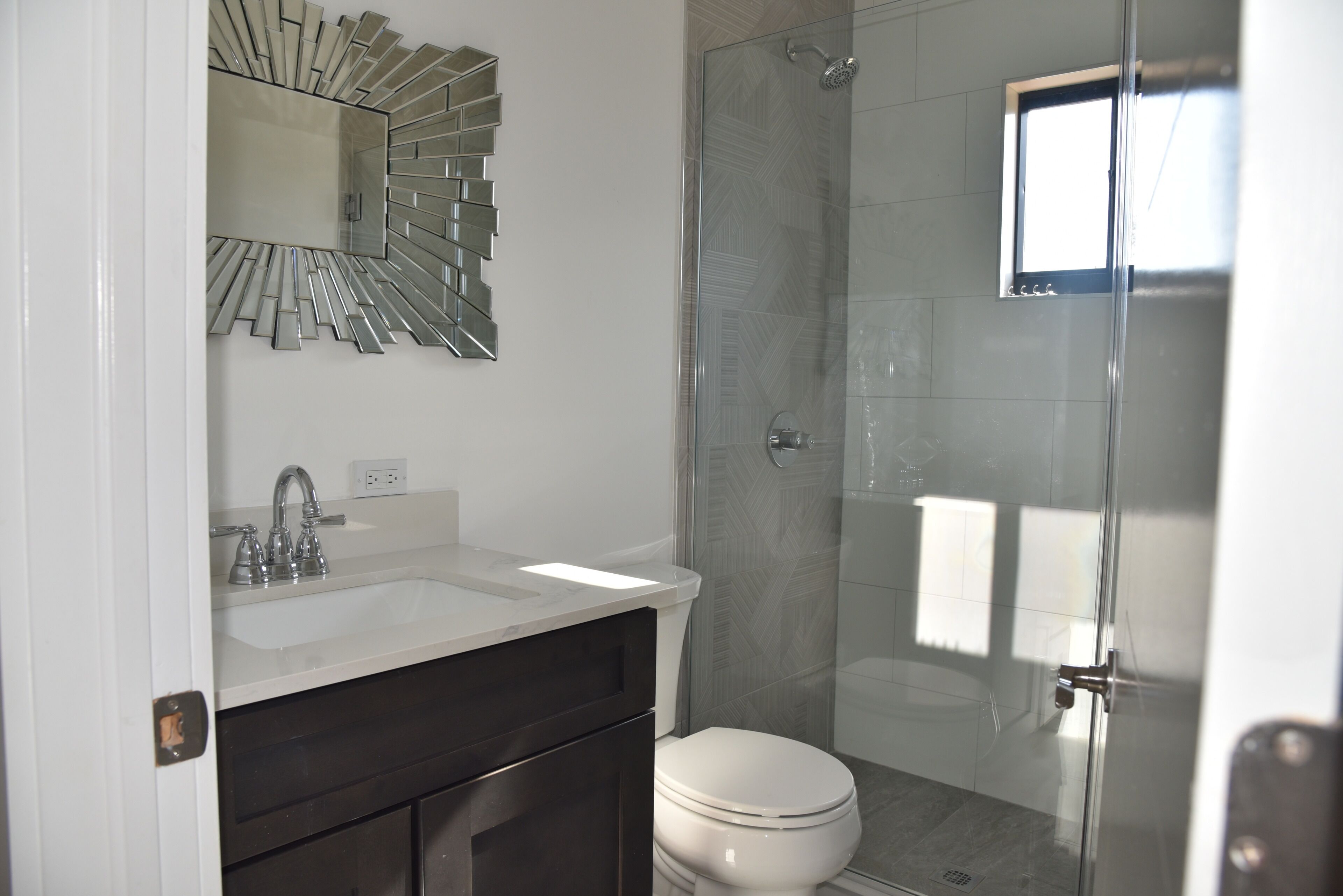Shower, towels, soap, toilet paper