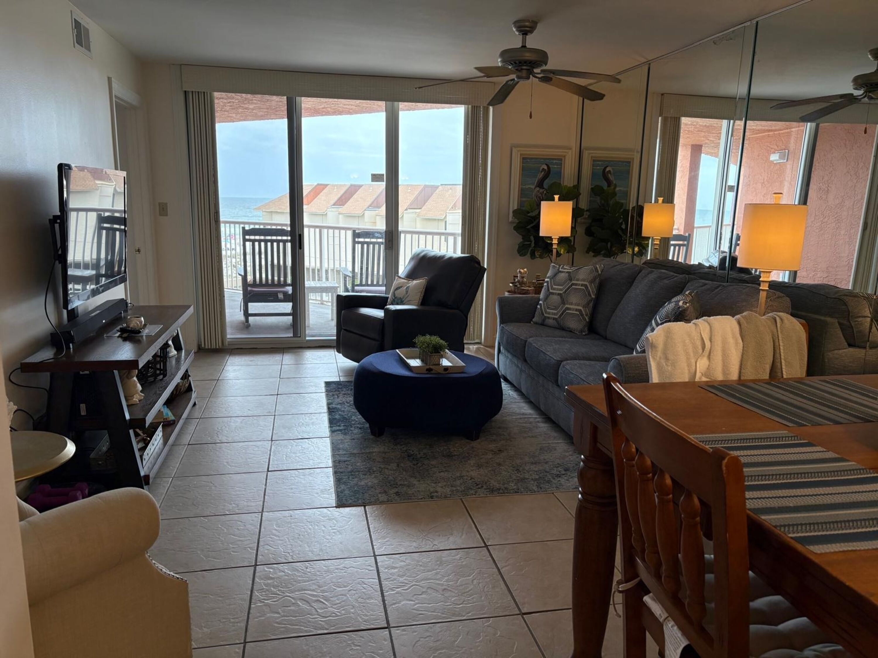 Exclusive Condo, Beach View | Living room | 50-inch Smart TV with digital channels