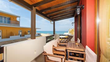 Luxury Villa, Balcony, Partial Sea View | Outdoor dining