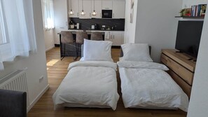 1 dormitori, planxa i posts de planxar, wifi gratuïta i roba de llit 