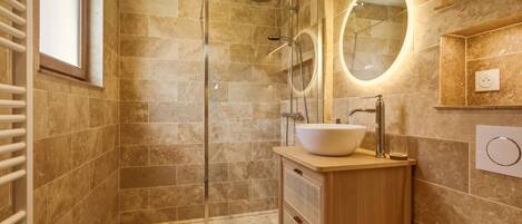 Shower, hair dryer, towels, toilet paper