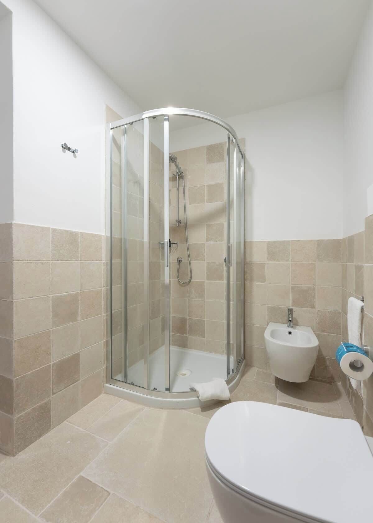 Shower, hair dryer, shampoo