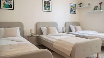 Comfort Triple Room | Minibar, desk, laptop workspace, iron/ironing board